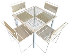 Post modern 1970s 4 Spaghetti chairs & grid table set by Giandomenico Belotti