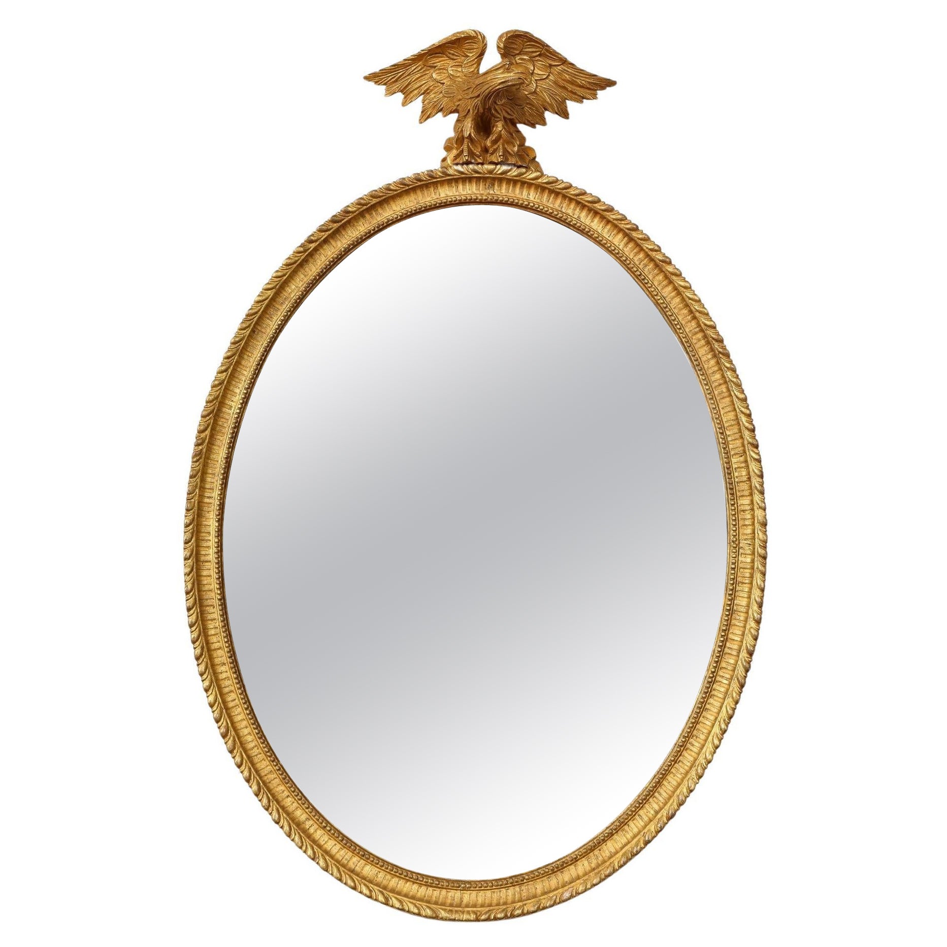 Miroir ovale géorgien en bois doré avec écusson d'aigle