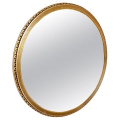 Hollywood Regency Round Carved Giltwood Mirror, 1940s