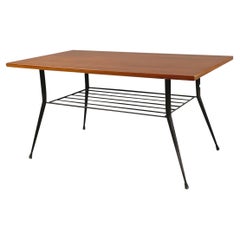 Retro Italian mid-century Coffee table with magazine rack in wood and metal, 1960s
