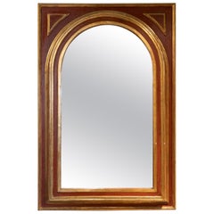 Wall Mirror in the Shape of a Semicircular Arch in Reddish and Gold