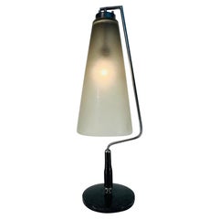 Used Italian white 1960 glass, marble and wood table lamp.