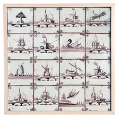 Collection of 16 Delft Tiles Mounted in Frame