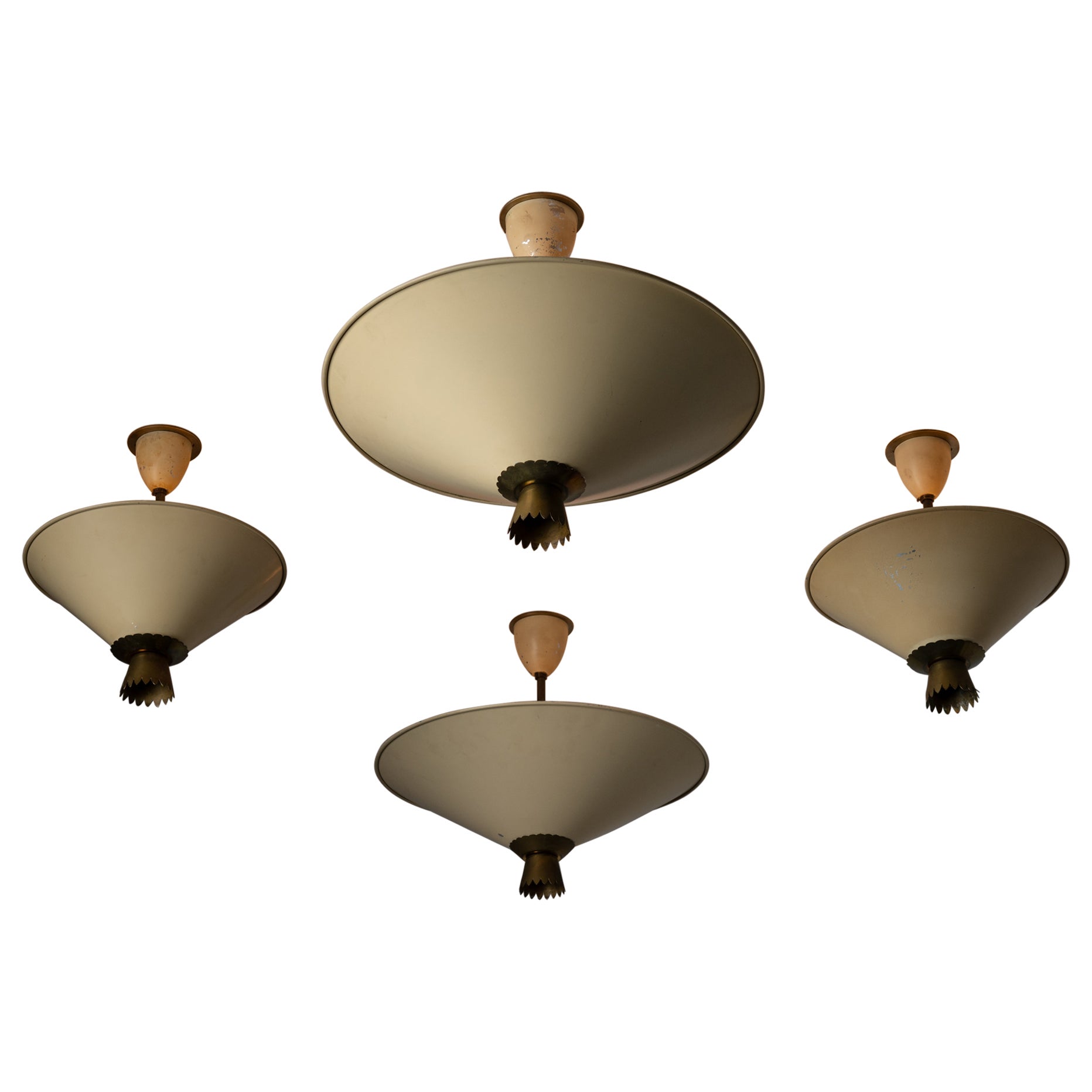 Single Flush Mount by Stilux. Designed and manufactured in Italy, circa the 1950s. Cream colored shades with aged brass bottom scalloped accent. Each fixture holds a tri-socket, adapted for the US. We recommend 40w max bulbs. Bulbs not provided.