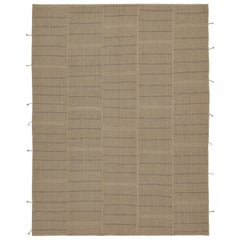 Kilim moderno de Rug & Kilim en rayas naranjas beige y óxido con topos