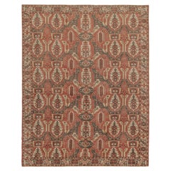 Rug & Kilim’s Classic Tribal style Rug in Brick Red with Geometric Patterns