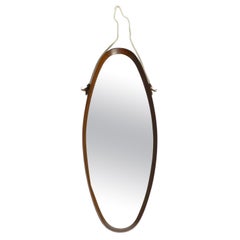 1960s oval large teak wall mirror with thick nylon rope  Made in Italy