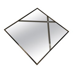 large 1970s rhombus-shaped mirror of Italian manufacture with brass frame