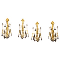 Antique Set of Four Late 19th / Early 20th Century Gilt Bronze and Crystal Sconces