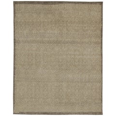 Rug & Kilim’s Distressed Tribal style rug in Beige and Gray Geometric Patterns