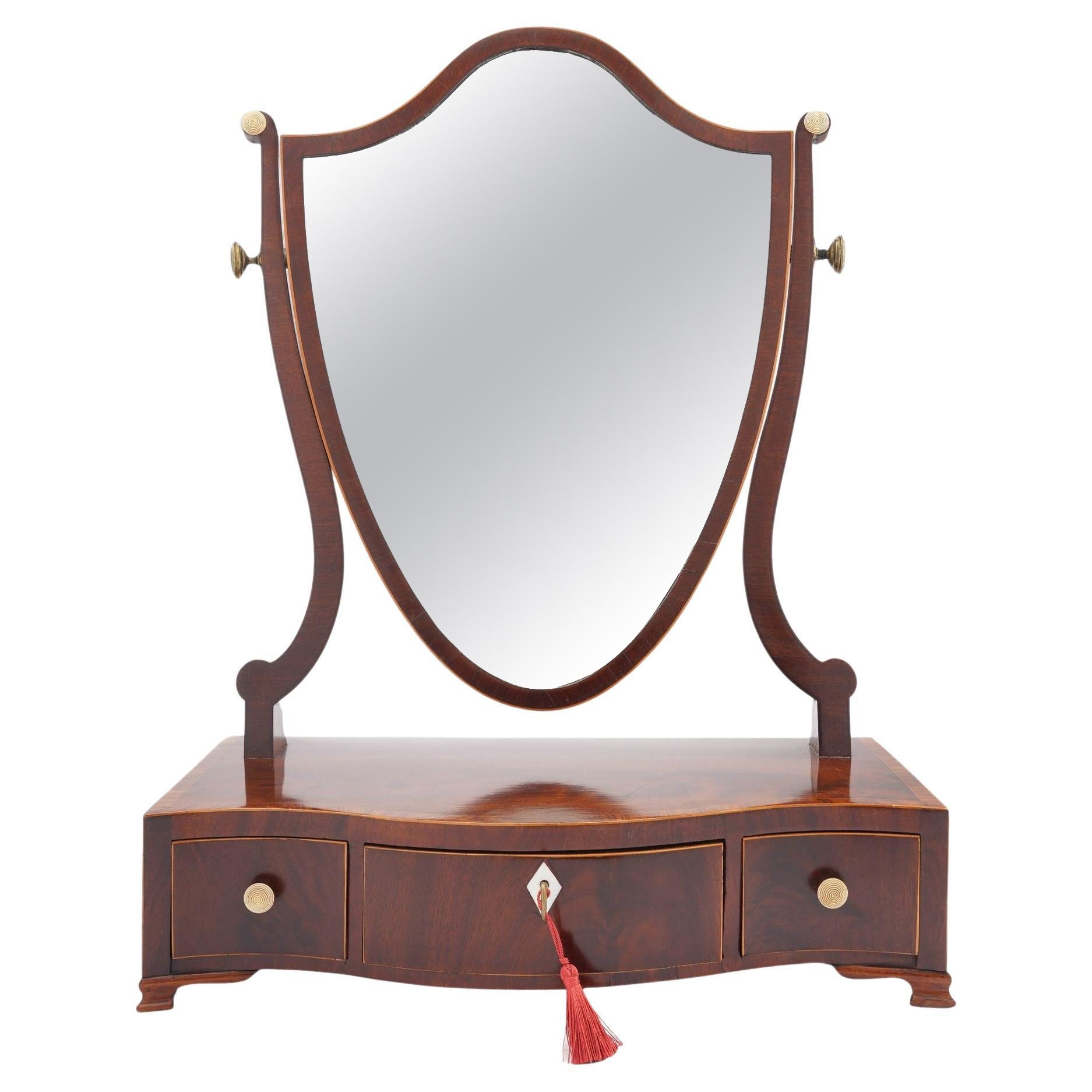 George lIl mahogany dressing mirror on a serpentine box stand, 1790 For Sale