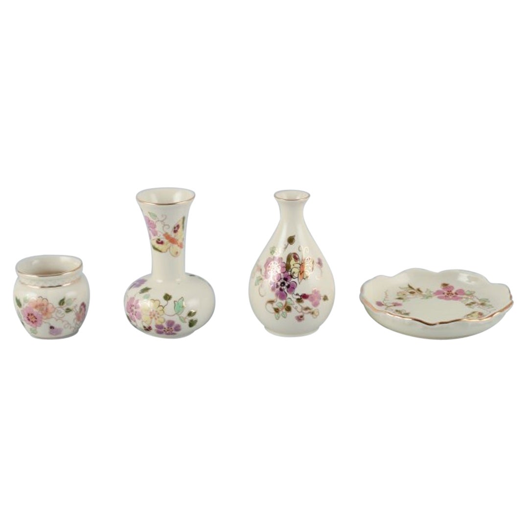 Zsolnay, Hungary, four-piece porcelain set. Three vases and a small dish For Sale