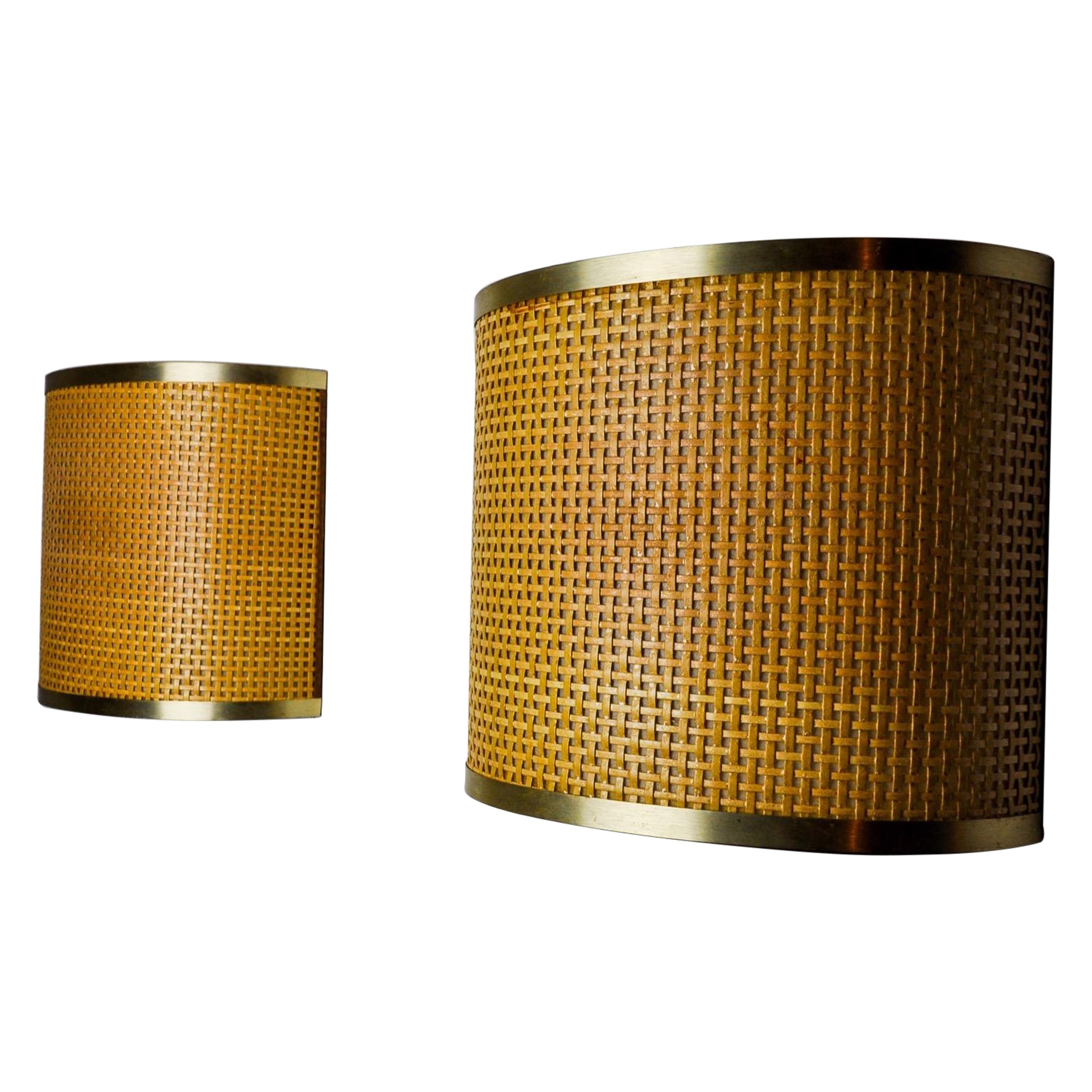 Pair of rattan and brass sconces, Italy, 1960