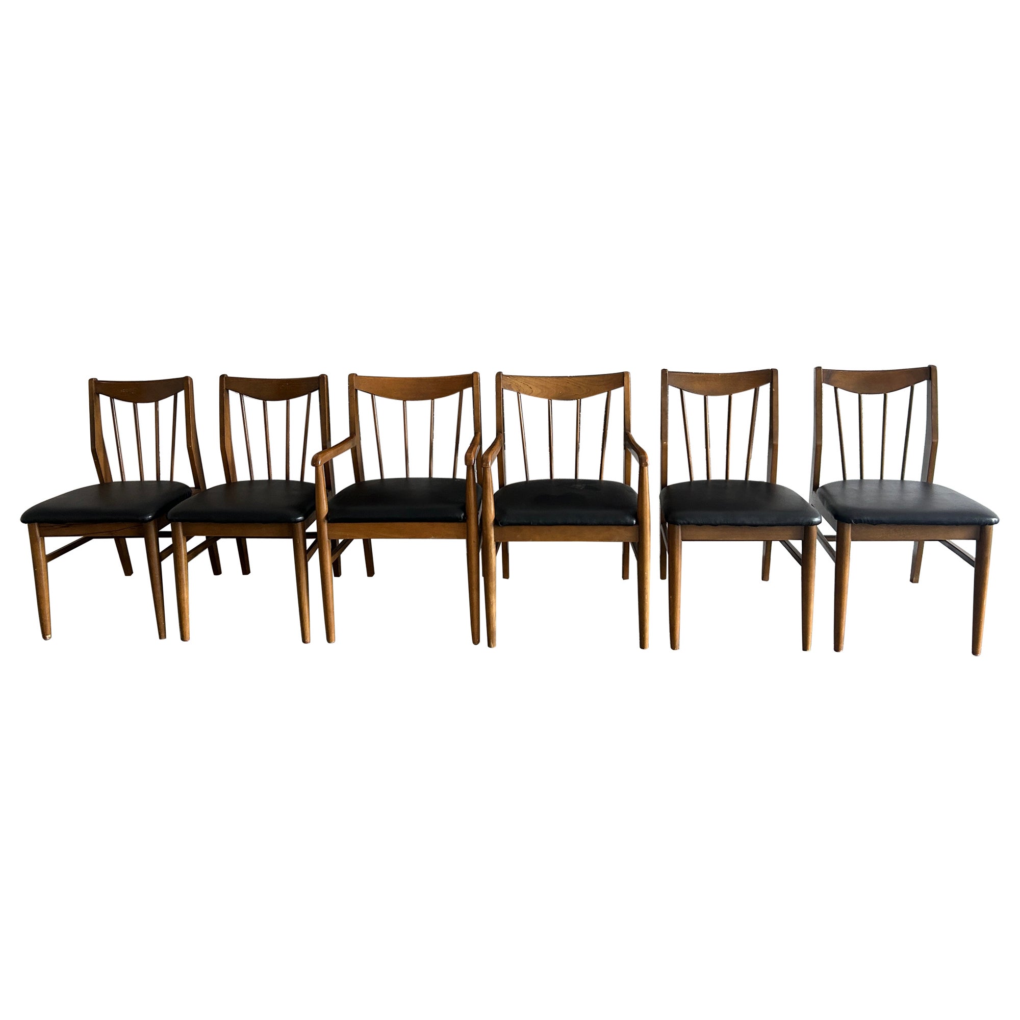 6 mid century spindle back American modern walnut dining chairs black vinyl For Sale