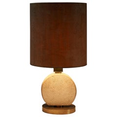 Naturel table lamp travertine base cork shade in the style of Studio CE.