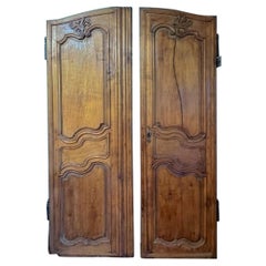 Pair of 18th Century French Carved Walnut Doors