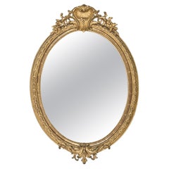 19th Century French Antique Gilt Wood Oval Mirror with Shell Crest
