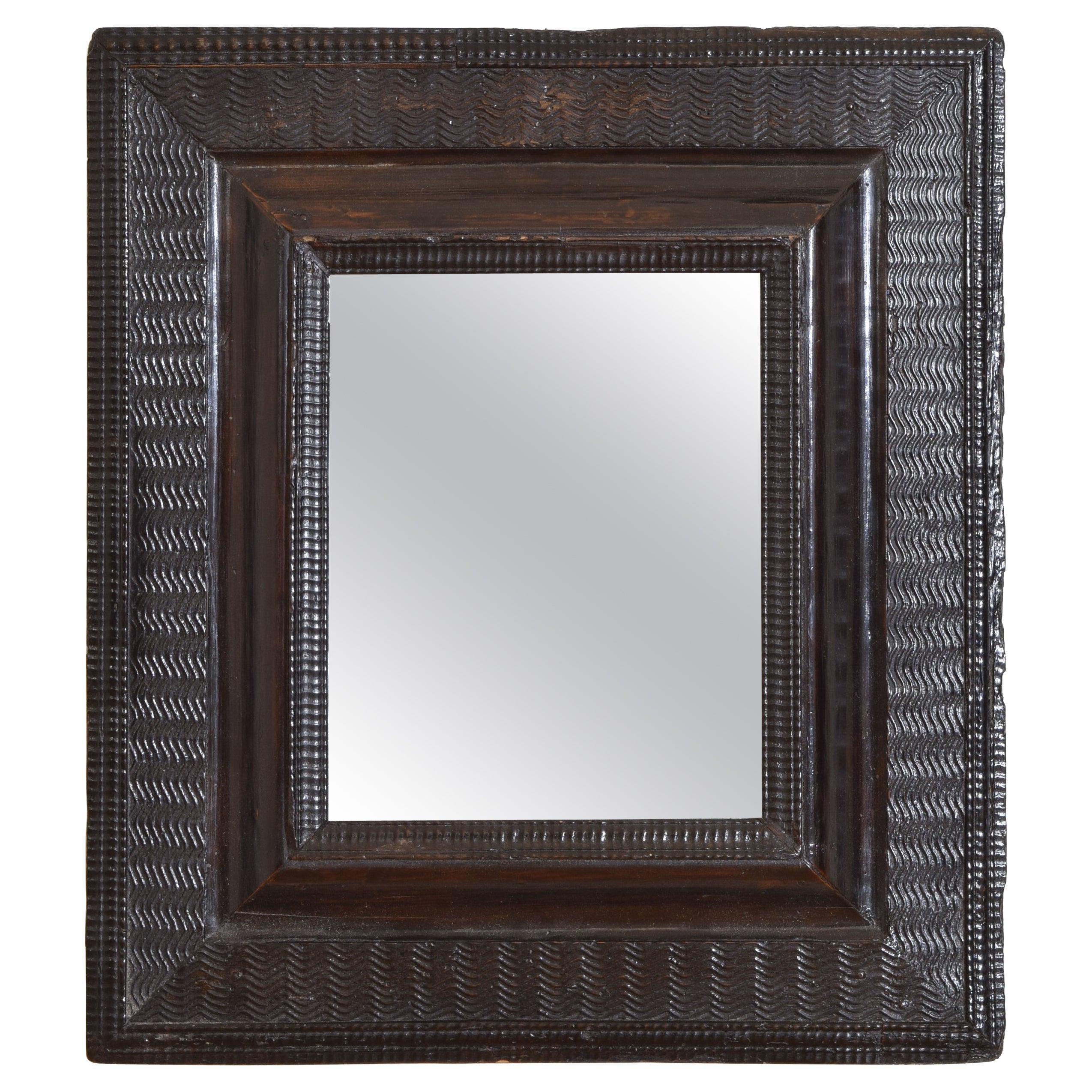 Italian, Lombardia, Small Ebonized Walnut Guilloche Mirror, mid 17th century