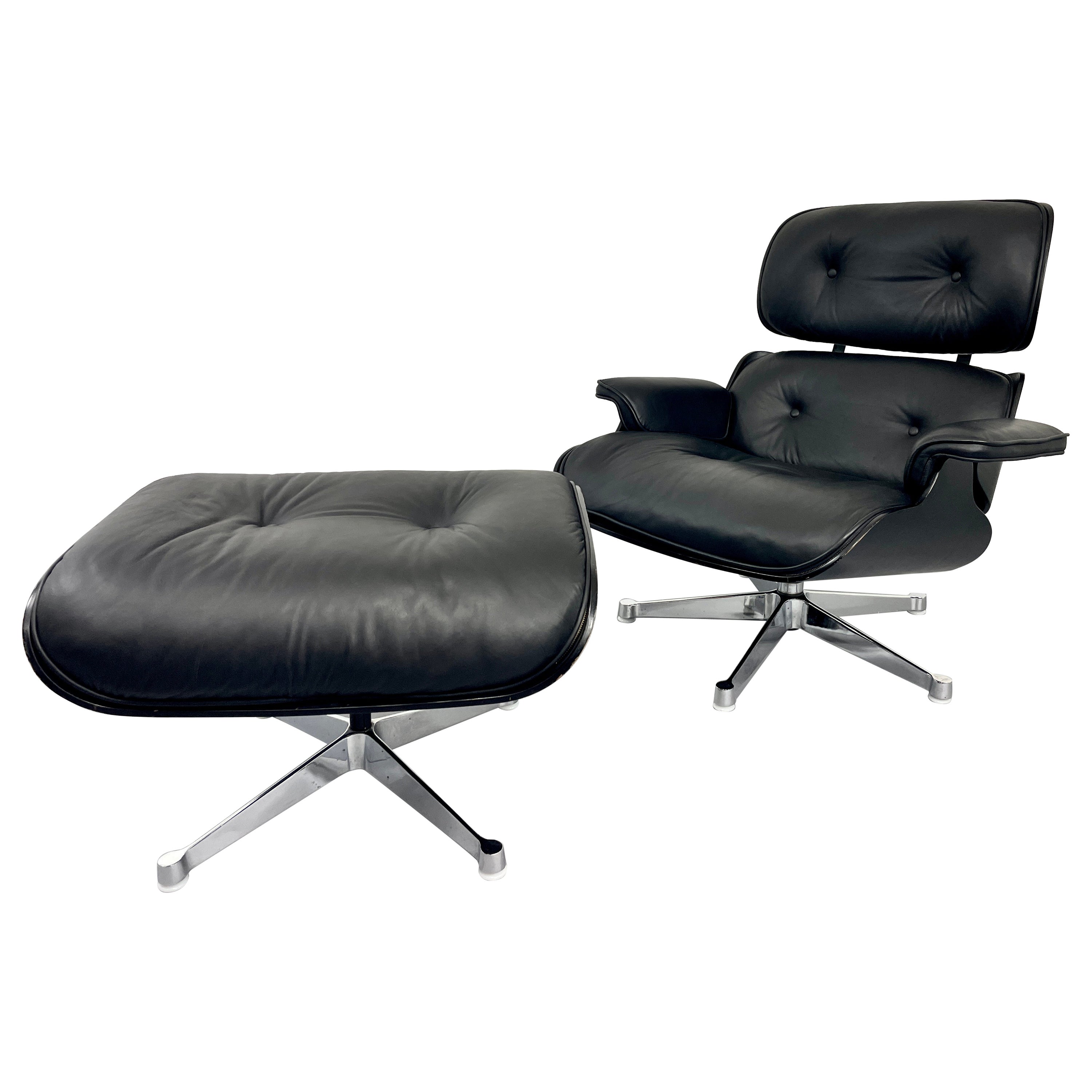 Black vintage Herman Miller Lounge Chair with Ottoman, designed by Eames 