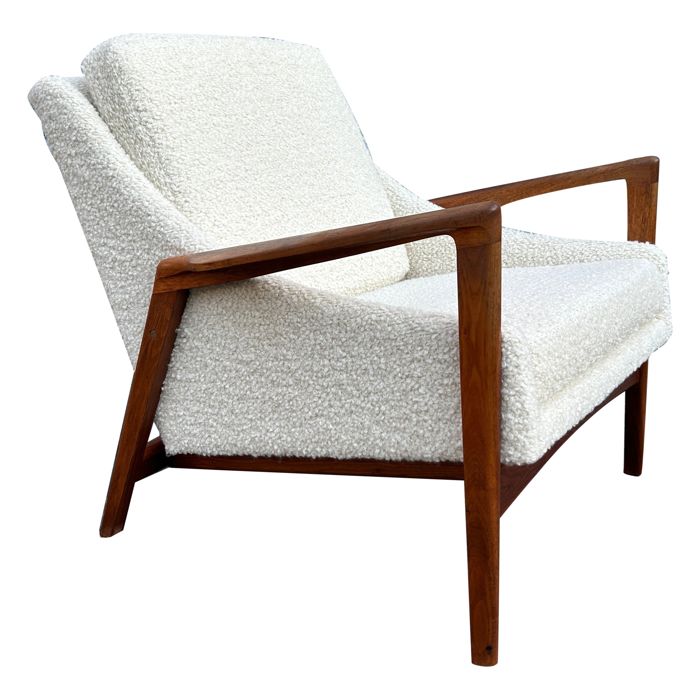 Stunning Mid Century Danish modern lounge chair in Boucle with wood frame For Sale