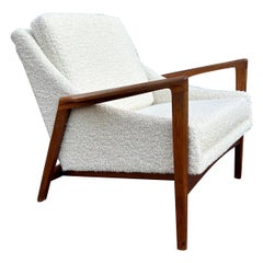 Stunning Mid Century Danish modern lounge chair in Boucle with wood frame