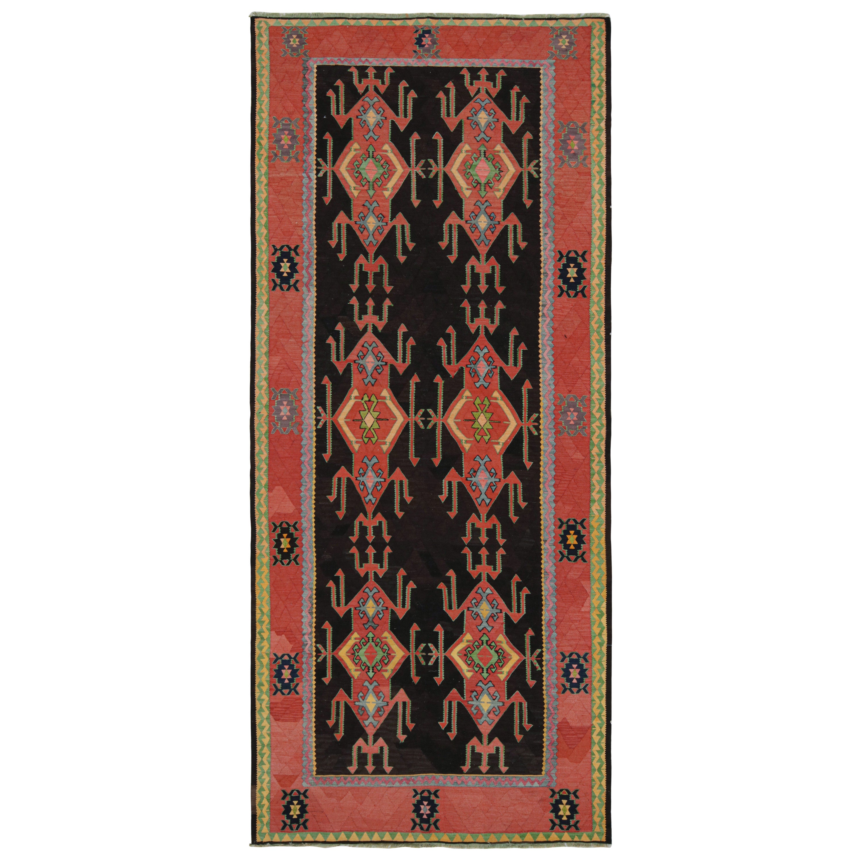 Vintage Persian Kilim with Red Patterns on a Black Field, from Rug & Kilim For Sale