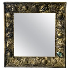 Vintage Italian modern square wall mirror foam rubber frame with eyes decorations, 1980s