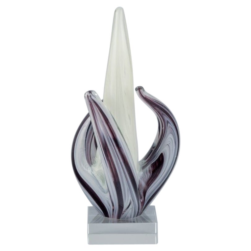Murano, Italy. Art glass sculpture in purple and white glass on clear glass base For Sale