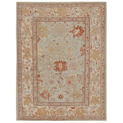 Rug & Kilim's Oushak Style Teppich in Himmelblau, Beige und Gold mit Blumenmuster