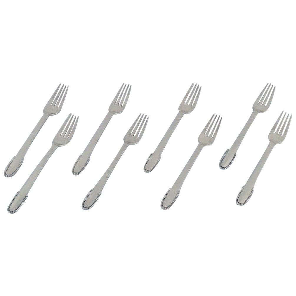 Georg Jensen Beaded. Set of eight lunch forks in 830 silver and sterling silver For Sale