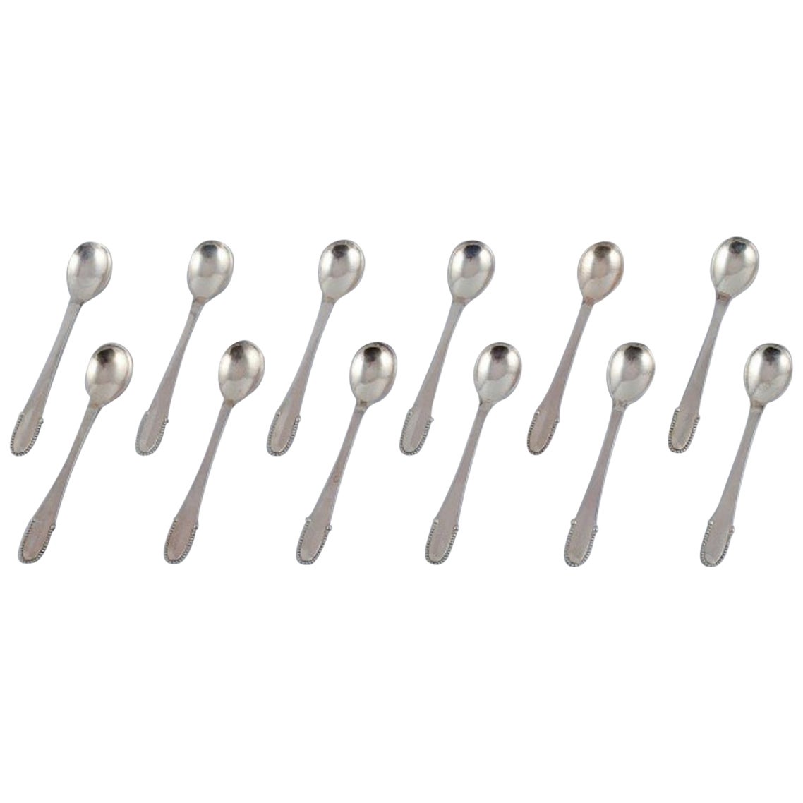 Georg Jensen Beaded. Set of twelve coffee spoons in sterling silver.