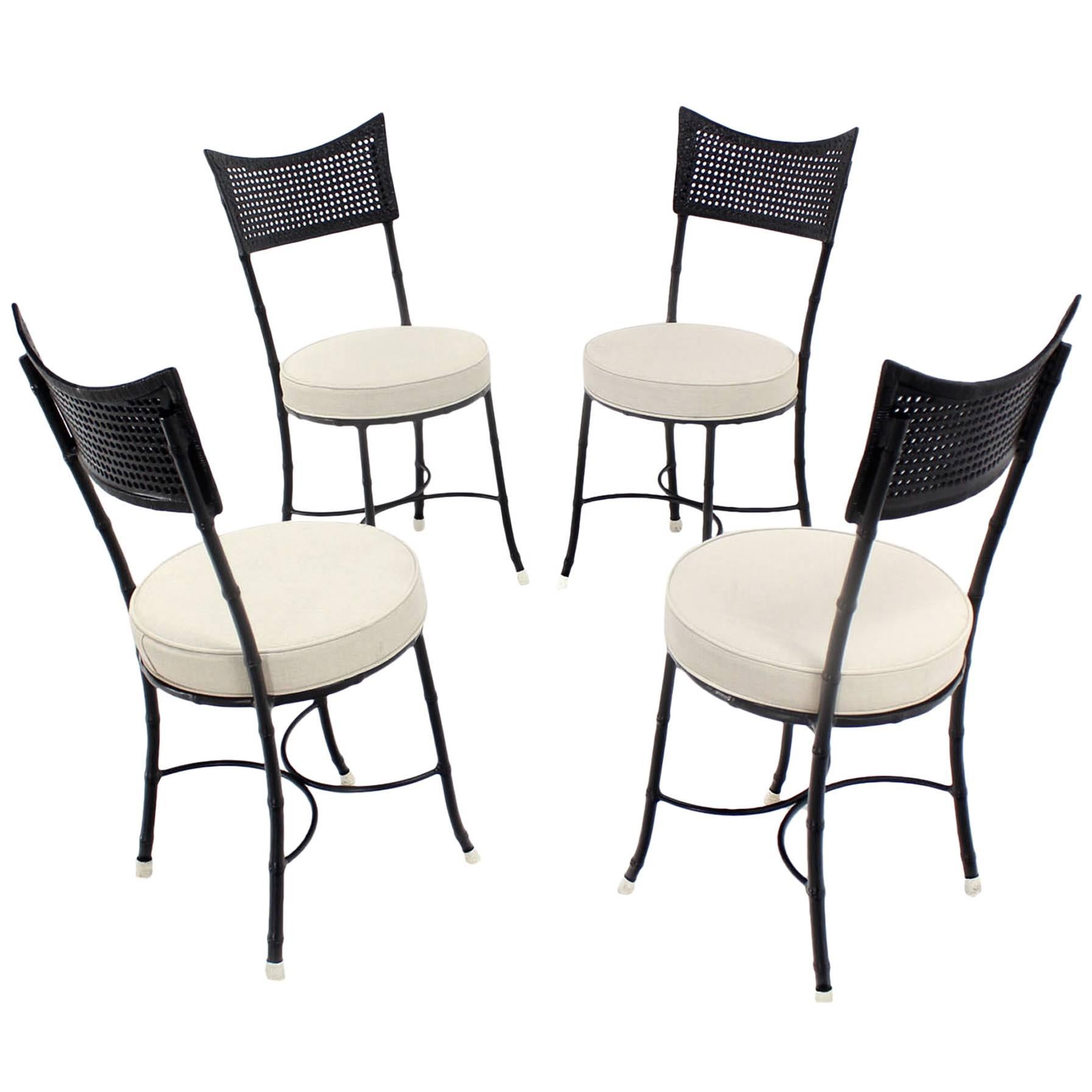 Four Cast Aluminum Faux Bamboo and Cane Round Seat Chairs