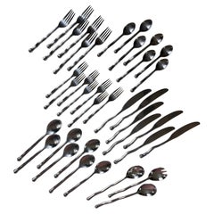 A 37piece flatwear cutlery set featuring squiggle motif, 20th century