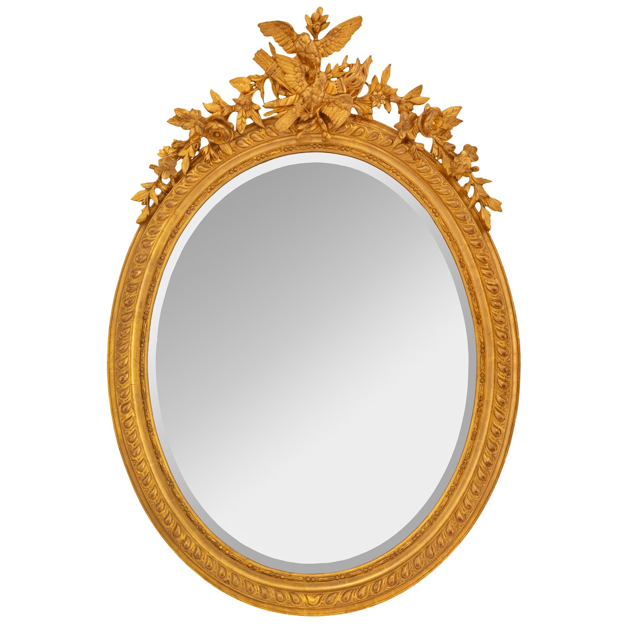 Miroir ovale de style Louis XVI du 19ème siècle en bois doré français en vente