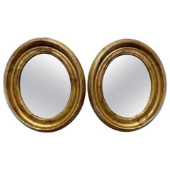 Pair of Antique Gilt Oval Italian Mirrors