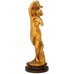Statue française du 19ème siècle, en bronze et bronze doré, allégorie de l'amour maternel