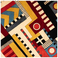 Rug,	or	tapestry	with	geometric	patterns and wool.	Contemporary	work.