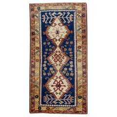 Tapis turc vintage rouge et bleu des années 1960, 2'5" x 4'7"