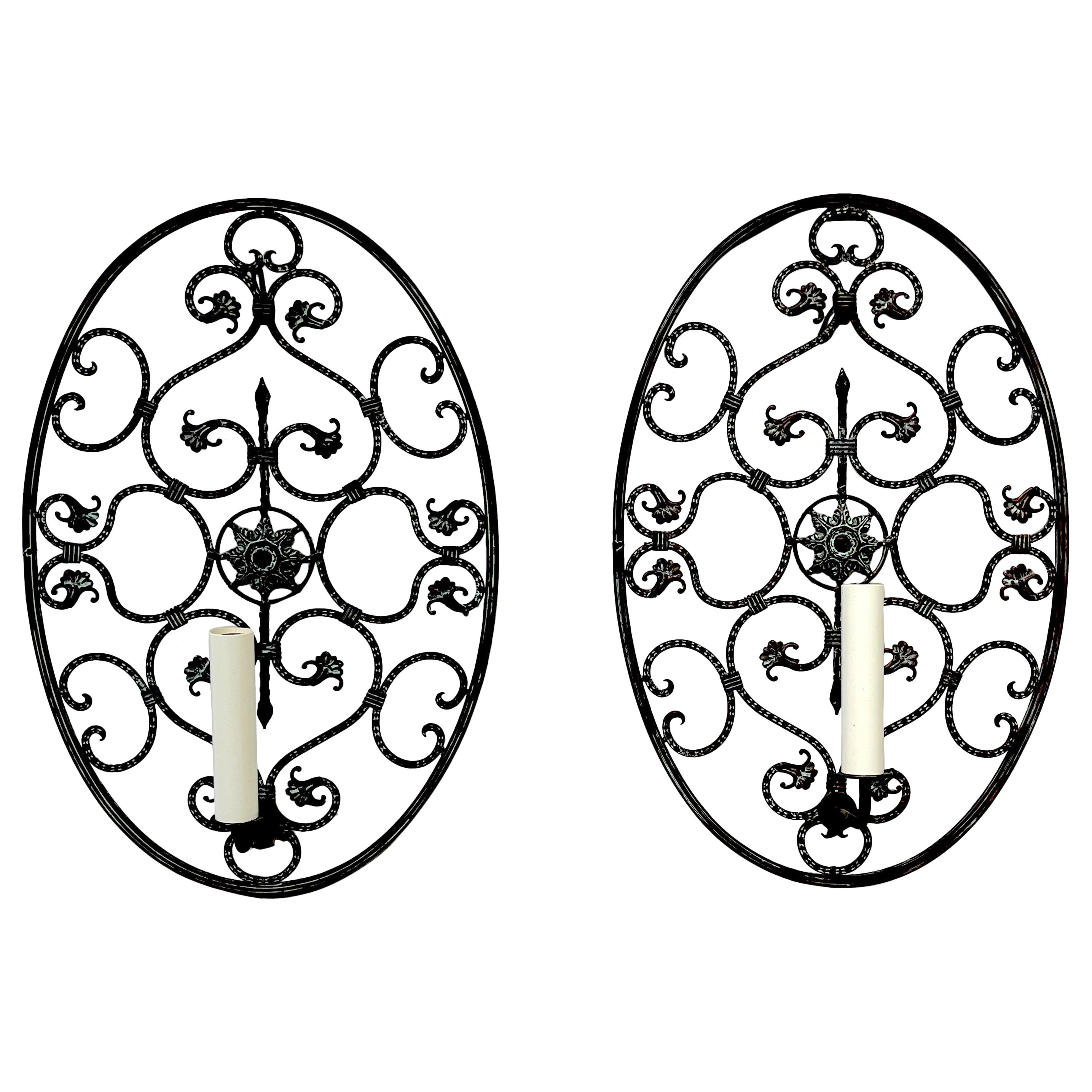 Pair of Mizner Style Neoclassic Pierced Bronze Oval Shield Sconces   