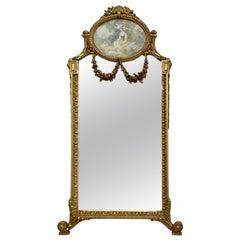 Specchio da parete/console in legno dorato in stile neoclassico francese con opera d'arte ovale