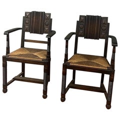 Pair of oak and straw armchairs "Dudouyt"