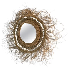 Round mirror in plant fiber