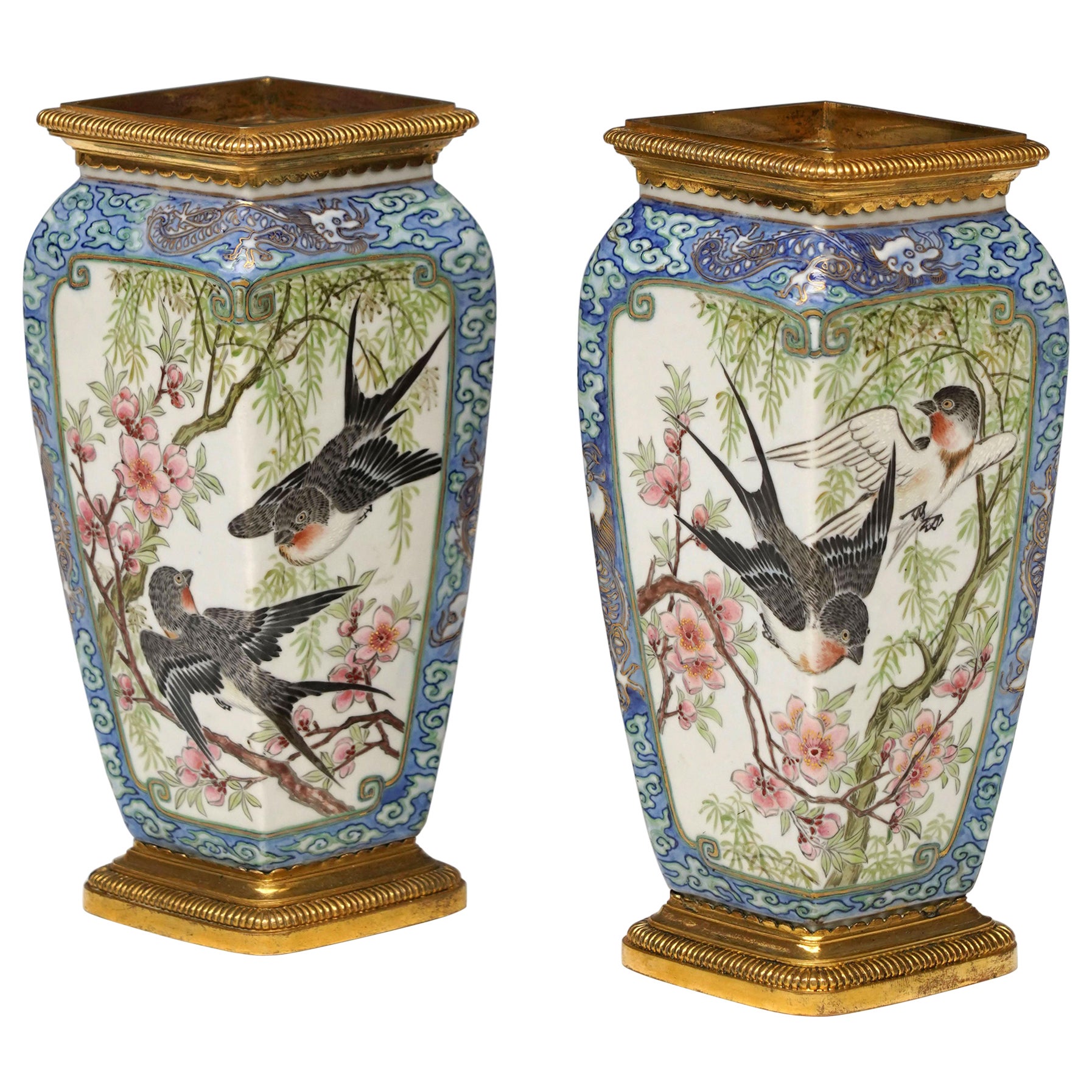 Pair  of porcelain “swallow” vases , L'Escalier de Cristal, France, 1890 For Sale