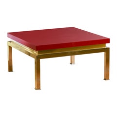China red lacquered coffee table with brass structure, Tommaso Barbi, Italy 1980