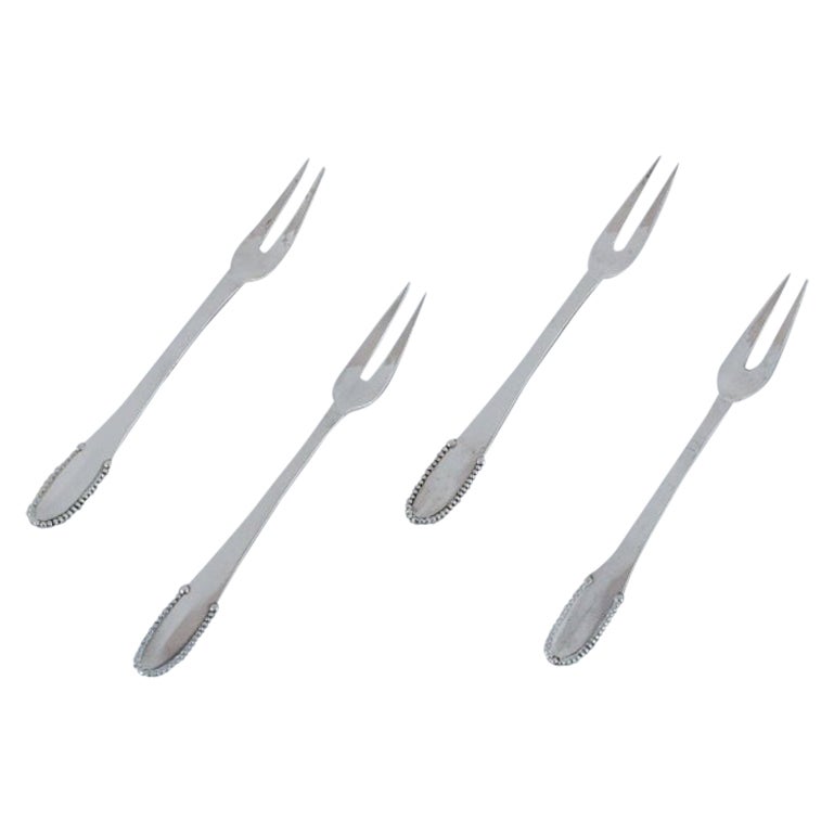 Georg Jensen Beaded. Four cold meat forks in 830 silver. Early 1915-1930 For Sale