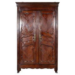 Armoire française en bois fruitier du 19ème siècle