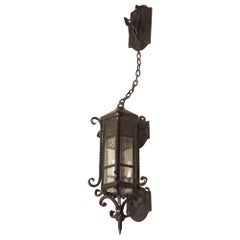 Hexagonal Wrought Iron Lantern with Chained Wall Mount