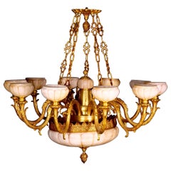 Sehr beeindruckender zehnflammiger Kronleuchter aus vergoldeter Bronze und montiertem Glas mit Alabasterschirmen