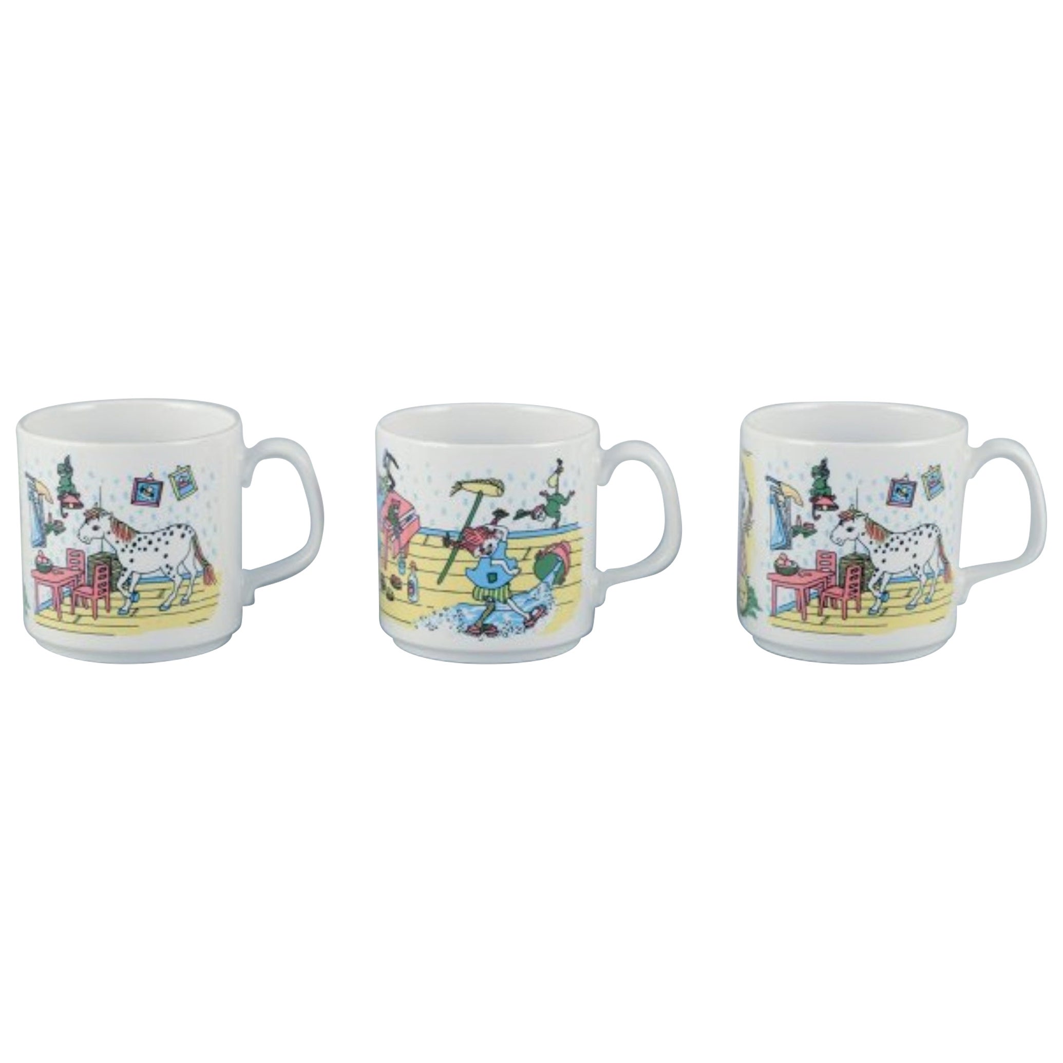 Rörstrand, three Pippi Longstocking mugs in porcelain. Late 20th C. For Sale