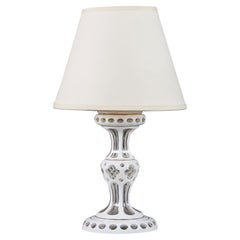 A 19th century small white cut glass table lamp